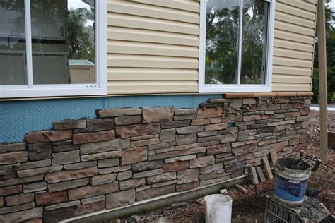 siding over brick panels